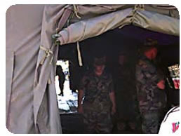 The Army Reserve Sets Up Tents for Camp Services